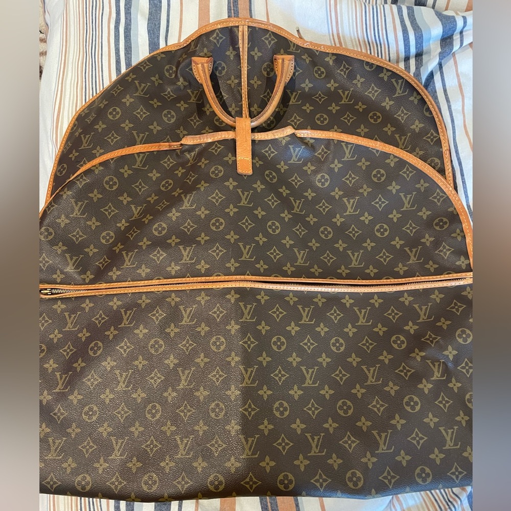 Vintage Louis Vuitton garment bag in excellent condition.
